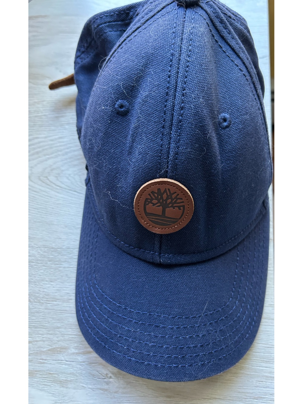 Timberland Dark Blue Canvas Cap with Brown Leather Logo Patch